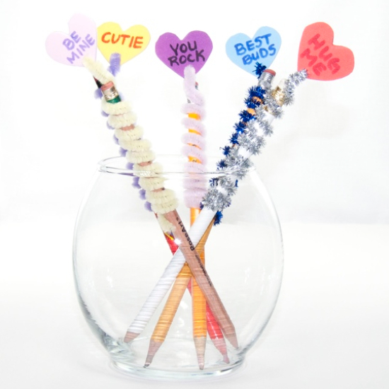 Are you looking for a fun and unique Valentine’s craft for kids – These DIY Candy Heart Pencil Toppers are the perfect alternative to traditional valentine’s day cards. All you need is a few Dollar Store supplies and you’ll be able to create an easy and cheap Valentine’s Day craft. These would be so fun for a classroom Valentine craft or at home for all your friends! Happy Valentine’s Day! easy pipe cleaner craft idea for kids.