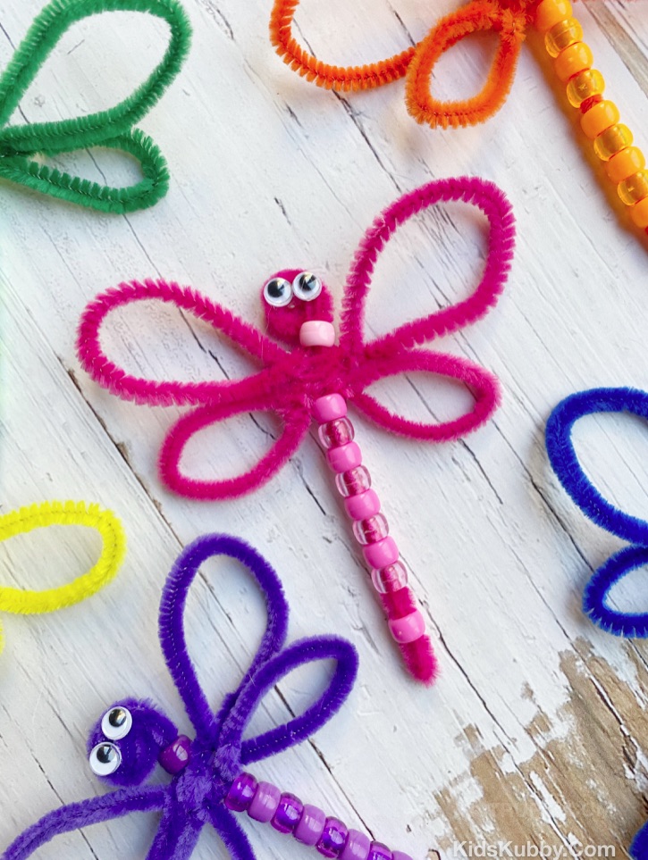 If you’re looking for fun craft ideas for your kids, these whimsical little dragonflies are a blast to make! They can be pinned to a cork board, added to a fairy garden, made into magnets, or simply enjoyed as a fun little trinket. Either way, they keep little hands busy when bored at home. This is an easy project for elementary age girls who are always looking for creative things to do. They can use any combination of colors they’d like! These also make for fun gift ideas for friends.