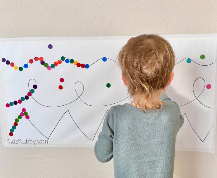 Looking for a great quiet time preschool activity? Try this sticker line activity from KidsKubby! It’s a fun fine motor activity that's easy to set up and provides hour of fun for your kids! All you need is craft paper and dot stickers to make this fun fine motor activity for your preschooler. Simply draw lines on your paper, tape it to the wall, and have your kids put the dot stickers on the lines. It’s really that easy. When are you going to try Sticker Lines?