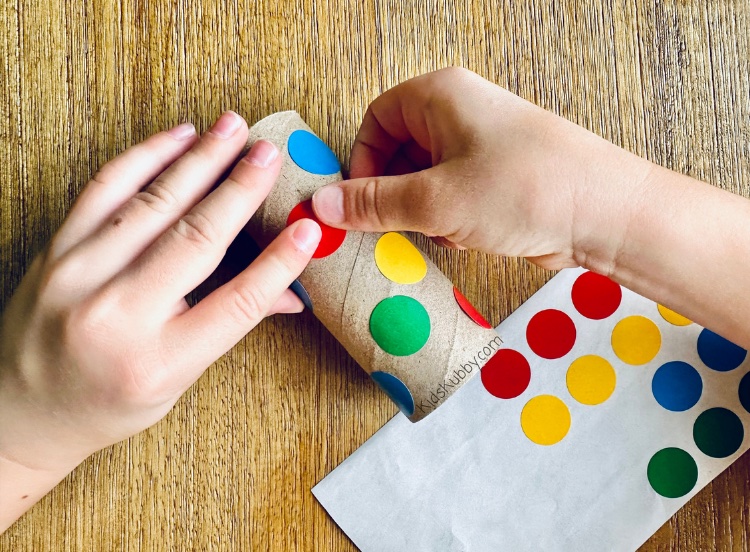 Toilet paper roll color sorting is a fun and easy way for kids to match colors. I love this color matching activity because it packs quite a learning punch. It takes about 3 minutes to set up and give kids not only color matching practice but also fine motor skill…! Set up is easy as 1-2-3. Take an empty toilet paper roll and make colored circles all over with markers, give your kids some dot stickers, and watch as they match the dot stickers with your marker circles on the toilet paper roll! 