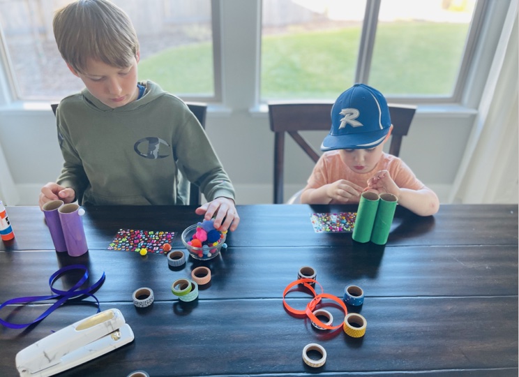This simple craft is great for letting your child use their creativity. Let them pick out their own color combinations, ribbon, and stickers. Both an indoor and outdoor activity!
