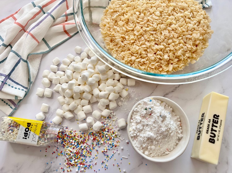 Looking for a fun birthday snack for kids – try cake batter rice krispie treats! This homemade dessert recipe is full of gooey marshmallows, rainbow sprinkles, and dry cake mix for a twist on a classic recipe. Your family and friends are going to go crazy over this no bake dessert. This is one of the best desserts ever, seriously! My kids go crazy over this easy dessert every time I make it! 