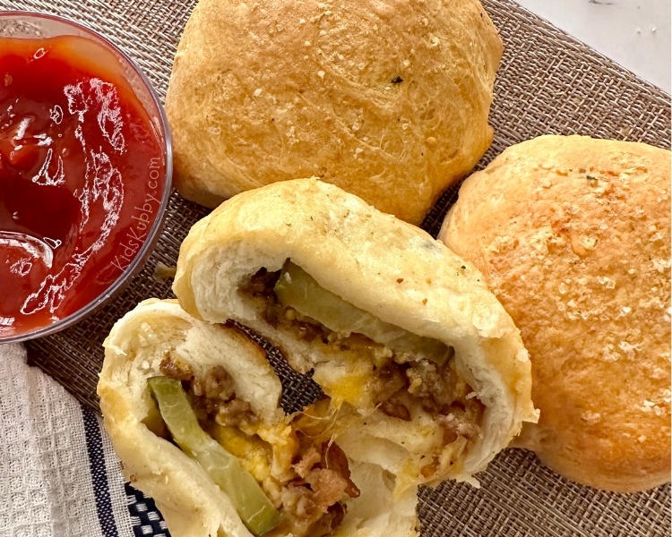 Are you looking for quick and easy ground beef dinner recipes for your picky family? These cheeseburger biscuit bombs are the ultimate comfort food! They're also really simple to make with just a handful of cheap ingredients. The perfect recipe for busy parents. Such an easy weeknight meal.