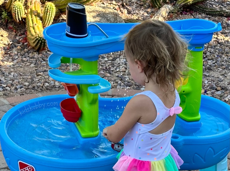 A water table is the best summertime toy for toddlers and preschooler. Yes, we love the pool, but a water table keeps kids entertained far longer than swimming it seems. Check out this budget friendly way to upgrade your water table. A simple pump and 5 minutes will create flowing water and happy kids. Give it a try today!