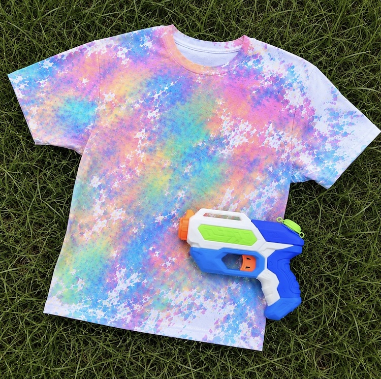 Fun way to tie dye with squirt guns outside.