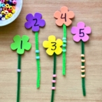 How cute is this foam flower counting activity? It’s great for toddlers and preschoolers as they learn to count. Head to the dollar store today to pick up some foam flowers, green pipe cleaners, and pony beads. This counting game takes 5 minutes to prepare and will keep kids entertained for much longer!