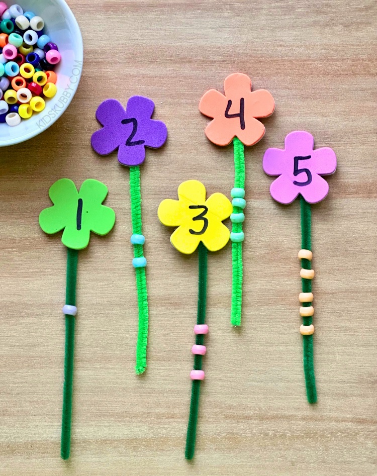 How cute is this foam flower counting activity? It’s great for toddlers and preschoolers as they learn to count. Head to the dollar store today to pick up some foam flowers, green pipe cleaners, and pony beads. This counting game takes 5 minutes to prepare and will keep kids entertained for much longer!