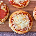 If you like pizza, then you can’t go wrong with this 5 minute air fryer mini pizza recipe. This 3 ingredient dinner recipe is so simple, even the kids can make it.