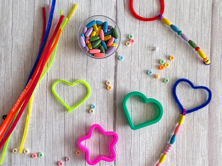 if you're looking for a fun pipe cleaner craft for kids, look no further. DIY bubble wands are so easy and fun to make. Kids love choosing the shape and color of their homemade bubble wand. Plus this craft is a cheap to make. I love a good dollar store craft idea!