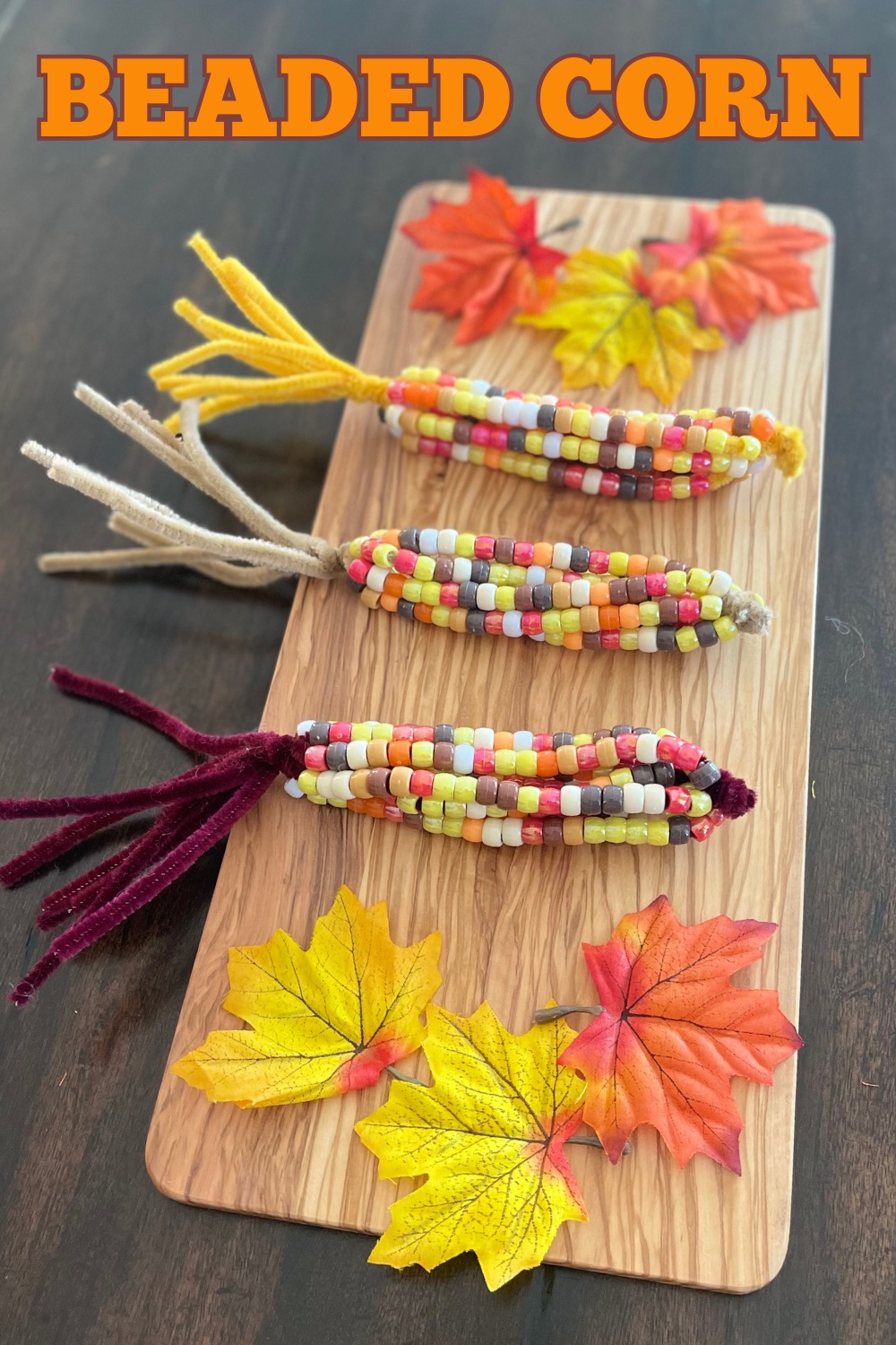 Beaded corn crafts with pipe cleaners and pony beads is a fun and educational fall activity for kids. Let your kids explore creativity and fine motor skills this fall!