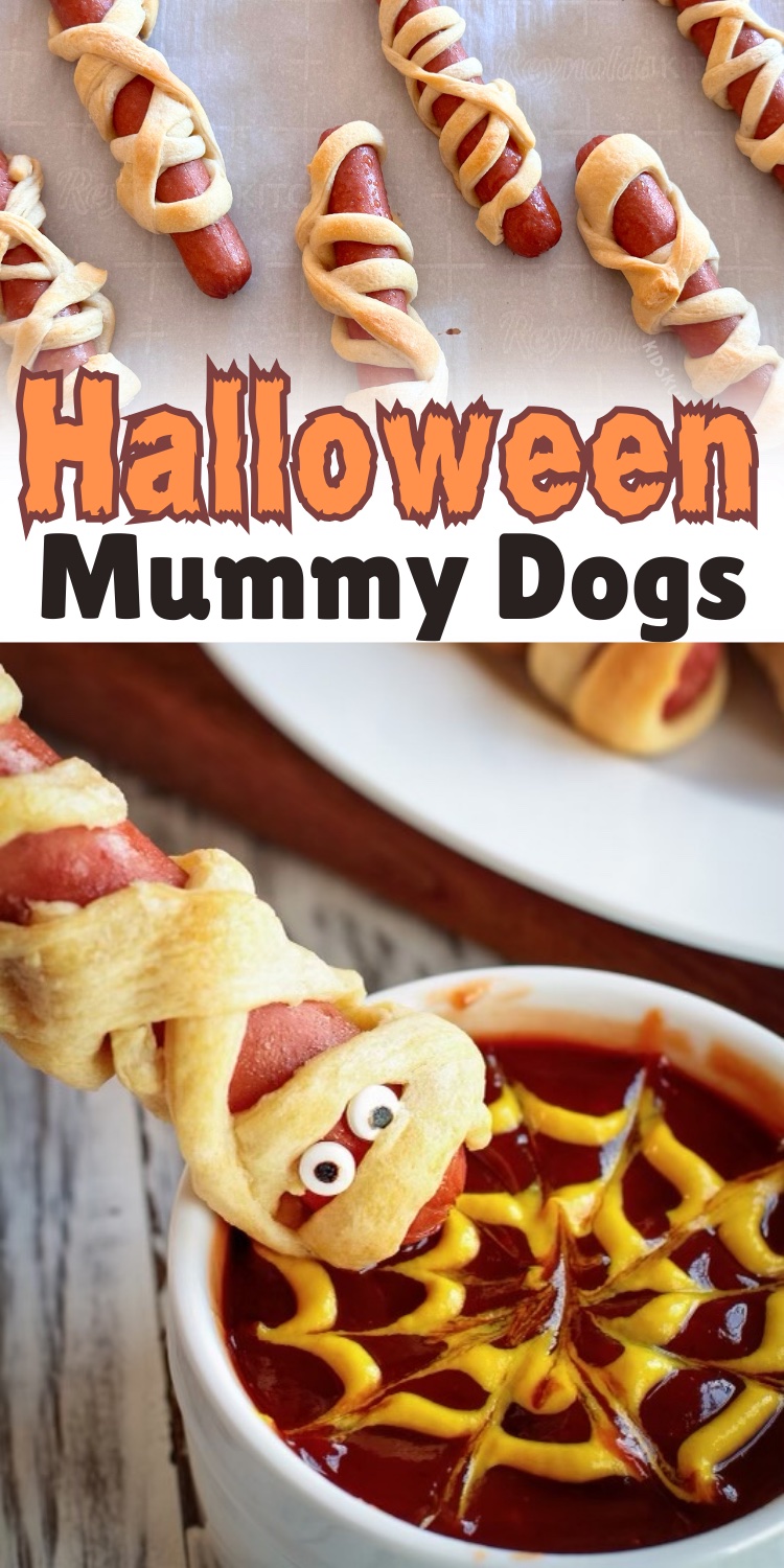 Juicy hot dogs wrapped in buttery crescent rolls topped with adorable candy eye balls. Mummy Dogs - the perfect kid friendly recipe for halloween. 