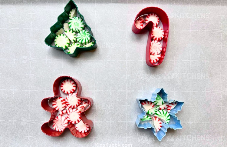 how adorable are these DIY peppermint ornaments made by just melting peppermint candies in fun cookie cutter shapes. This budget friendly Christmas activity is perfect for kids of all ages. Attach these to teacher or friend gifts for an added holiday touch!
