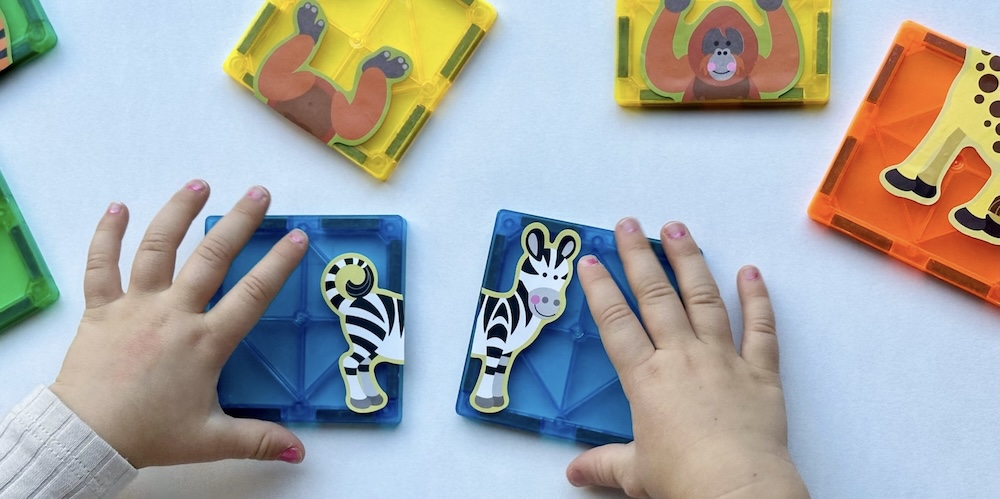 How to make an easy sticker matching game with just magnetic tiles and large stickers. I mean you probably already have the supplies you need at home! give this fun homemade game for kids and try today!