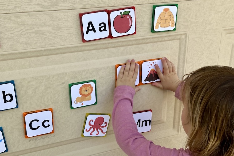 Easy outdoor activity for kids that teaches alphabet sounds and matching. This is the perfect preschool activity that can be done at school or at home. Beginning letter sounds match game with free printable!