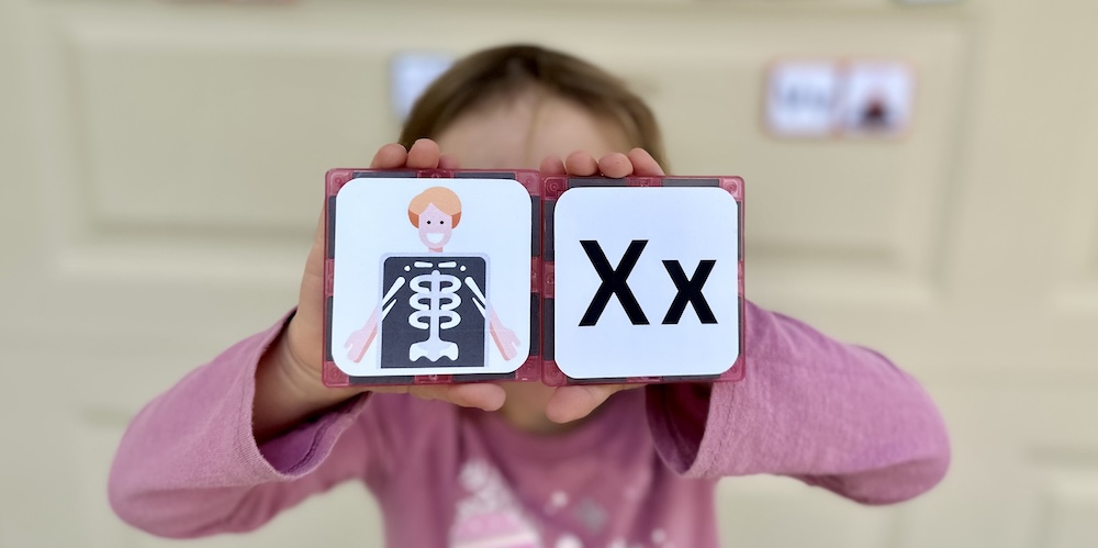 This fun letter and word matching game is a great way to teach phonics awareness to preschoolers. I love this pre-reading game because it's easy to make (with this awesome free printable), and it keeps kids entertained! It's a great budget friendly activity for kids since you probably already have all the supplies at home!