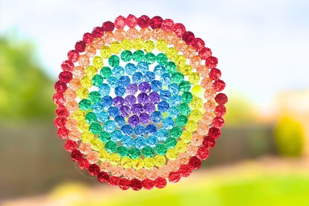 Step by step instructions on how to make melted bead suncatchers in a toaster oven, an easy project to do at home for kids with beads.