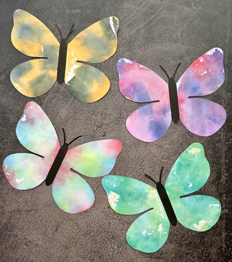 Check out this fun art project for kids using tissue paper to paint paper butterflies. This color transfer art project is easy and engaging for kids of all ages. The perfect spring or summer craft idea to preschoolers too. 
