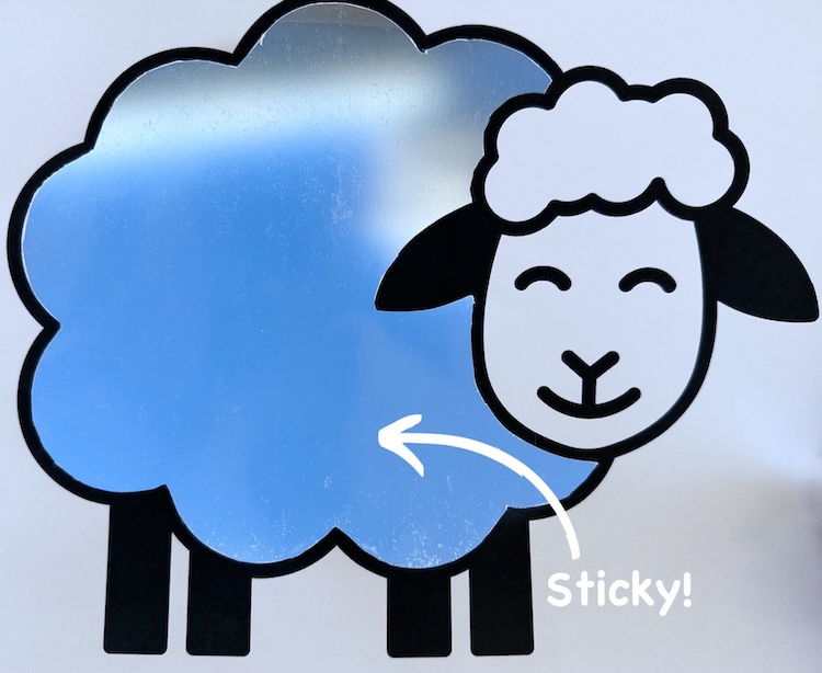 sensory sheep craft project for preschoolers using contact paper and cotton balls. Free printable included. the perfect sheep craft for preschoolers. 