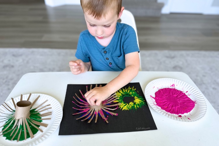 DIY painted fireworks using cheap supplies you probably already have at home. This easy summer craft idea is perfect for kids of all ages. Check out this step by step tutorial on how to make paper roll painted fireworks.
