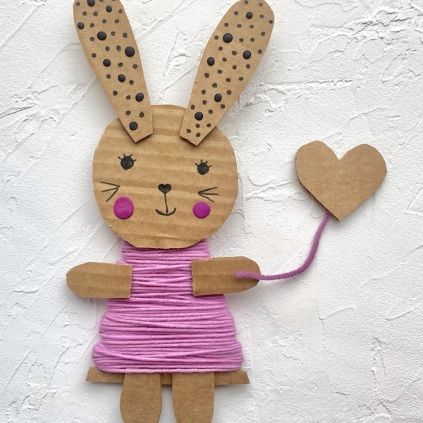 Cute craft idea for kids! Try making these adorable bunnies out of cheap recycled materials including cardboard, yarn, and markers. Super fun for children of all ages. They are fun to play with as well as decorate your home during spring or Easter.