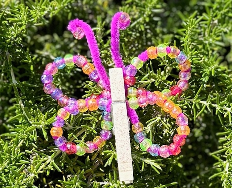 Fun and easy butterfly craft for kids of all ages using pipe cleaners, pony beads, and clothespins.