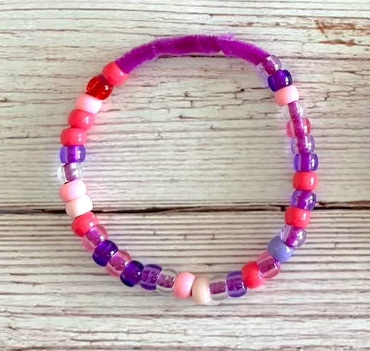Easy pony bead and pipe cleaner craft idea for kids to make at home. 