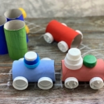 Fun toilet paper roll craft for kids made with cheap recycled materials from home including plastic bottle caps! Step by step tutorial on how to make a cardboard train set.