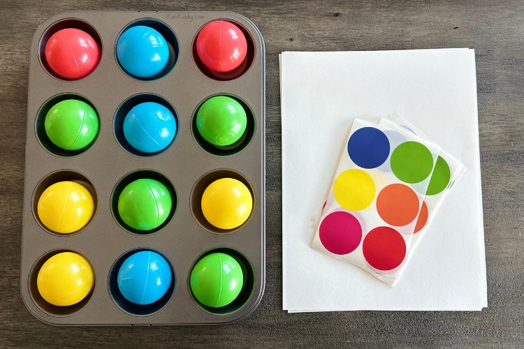 Easy activity for kids using plastic balls and muffin pans. This simple to make game will keep kids entertained for hours. 