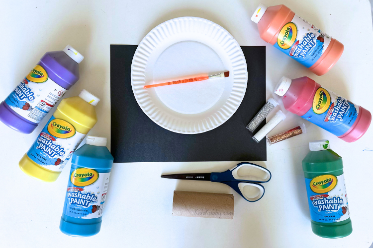 DIY Craft Tutorial For Kids | How to make charming little painted fireworks out of just a few common craft supplies! recycled paper rolls, paints, and glitter.