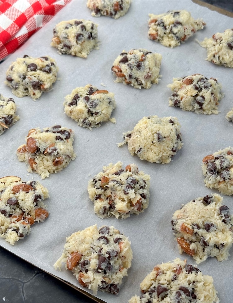 Craving something sweet? These Best Almond Joy Cookies are loaded with chocolate chips, shredded coconut, and almonds. Simple to make and so delicious! Pin this recipe for your next baking day!