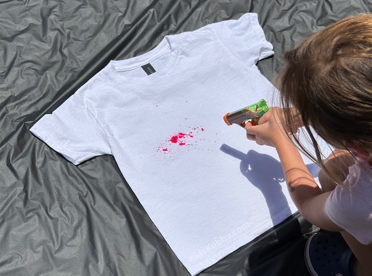 Splash into summer with this kids' water gun tie dye craft! Create vibrant shirts with this easy, outdoor activity. Perfect for kids of all ages.