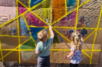 Easy painting activity for kids using boxes and tape to make the prettiest and creative mural ever.