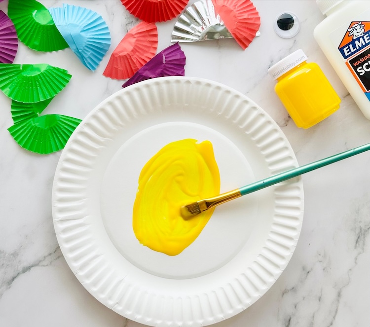 Create adorable paper fish with this simple to make paper plate craft. Kids will love adding the shiny scales to make the easiest fish craft ever. 
