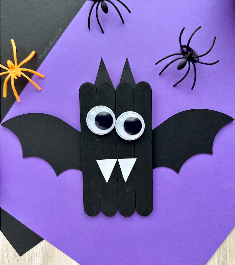 A spooky cute vampire bat craft using supplies you have on hand. This easy to make bat craft is so adorable with construction paper wings an large googly eyes. 