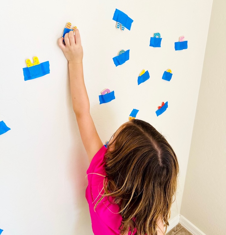 How to make the best alphabet learning game for kids using cheap supplies you already have at home. Easy homeschool lesson on letters that also incorporates fine motor skills and problem solving.