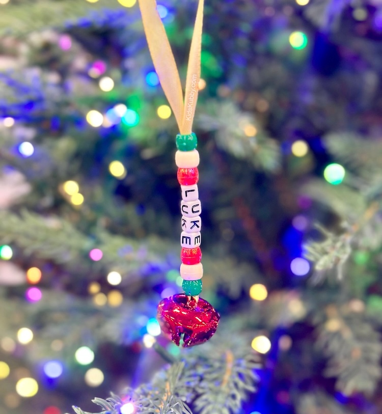 A budget friendly Christmas activity for kids using pony beads to make homemade ornaments with names.