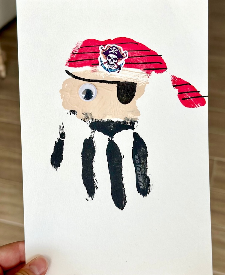Step-by-step tutorial on how to make a handprint pirate craft with just a few cheap craft supplies you have around the house. This east art project is sure to be a hit with kids of all ages. 