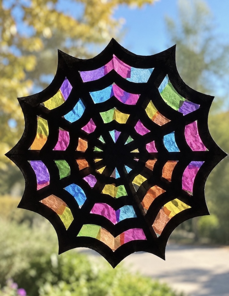 How to make spiderweb sun catchers for Halloween.