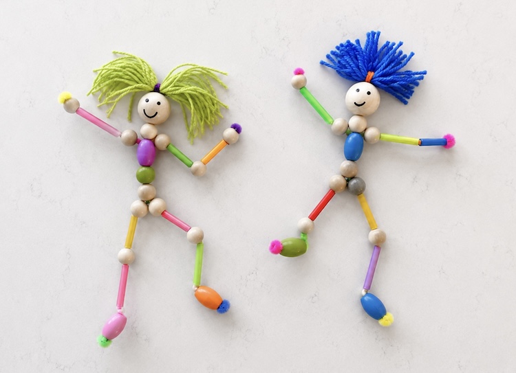 Beaded Dolls made with pipe cleaners and yarn for hair. 