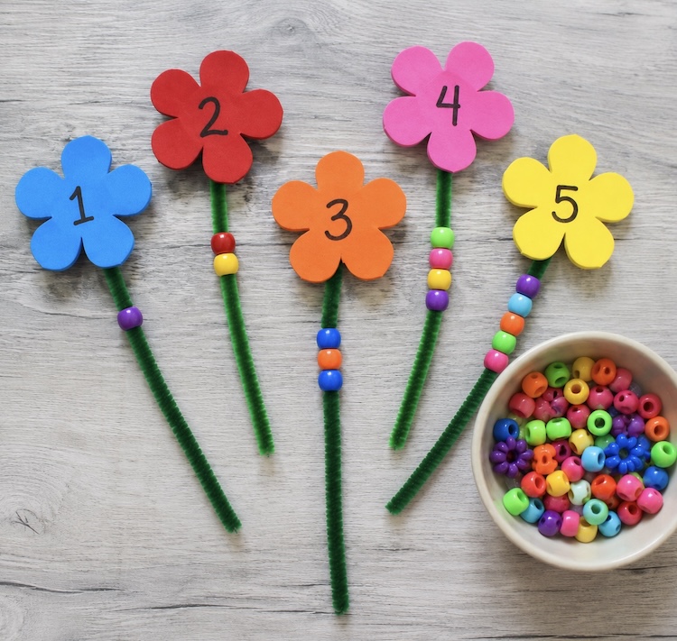 A fun craft and counting game for preschoolers. How to make Flower Counting Wands. Simply have them lace pony beads onto the pipe cleaner stems that match the amount written on the flower. 