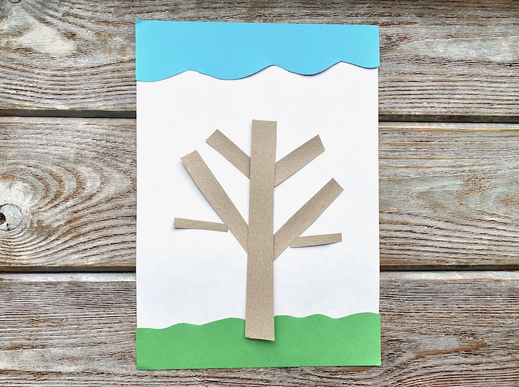 Spring tree craft for kids to make with colorful construction paper.