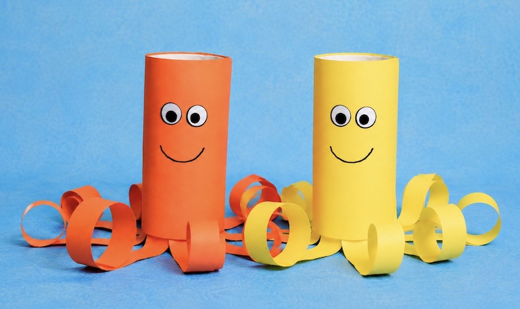 How to make adorable paper octopuses with colorful paper and googly eyes.