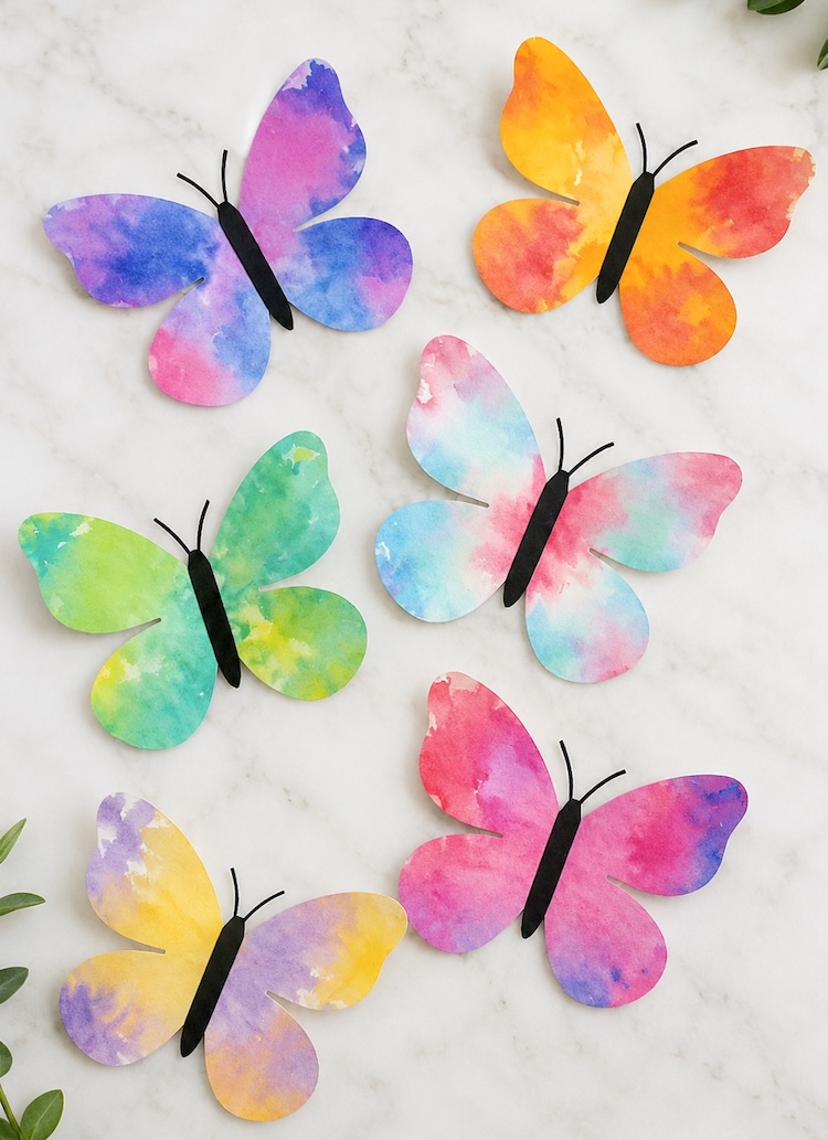 Free printable butterfly template with an easy tissue paper craft idea for kids with step by step instructions and lots of photos.