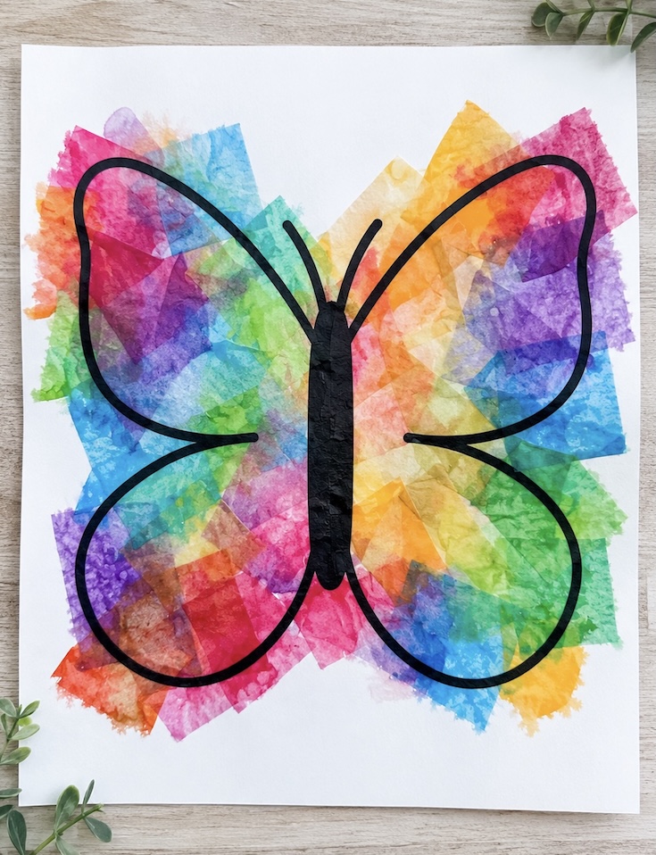 How to make a vibrant butterfly craft with bleeding tissue paper and a spray bottle. An easy art project for kids of all ages!