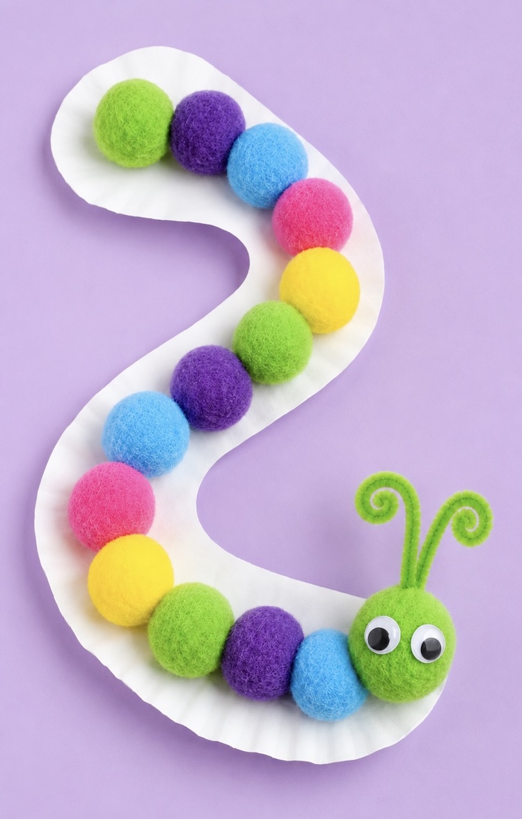 Colorful Pom Pom Caterpillar Craft idea for preschoolers and younger children.