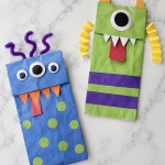 Monster craft ideas for Halloween | DIY craft tutorial on how to make scary yet cute monsters with brown paper lunch bags and construction paper.