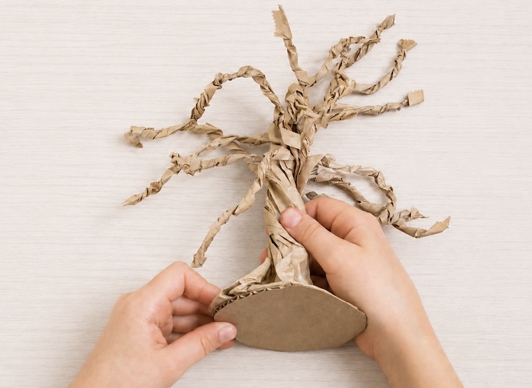 Recycled cardboard paper bag craft.