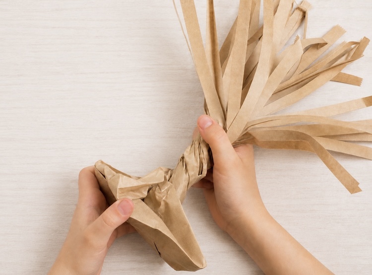 Step-by-Step Instructions on how to make an easy paper bag tree for fall or spring.