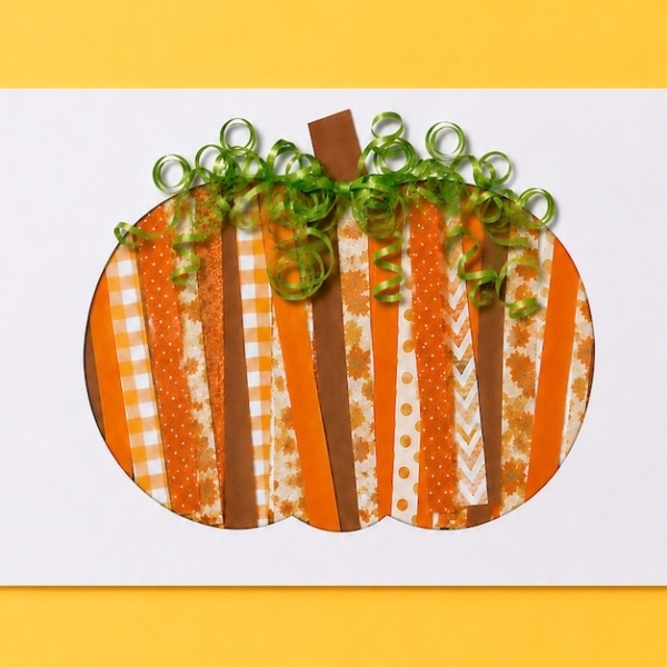 How to make awesome paper pumpkins with strips of colorful fall paper. An easy craft to set up for kids to make at home with cheap supplies.