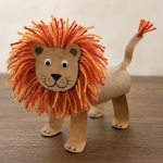 DIY Craft Tutorial: How to make adorable toilet paper roll lions with a fuzzy yarn mane and googly eyes. A fun animal craft for kids of all ages! So simple and yet impressive.